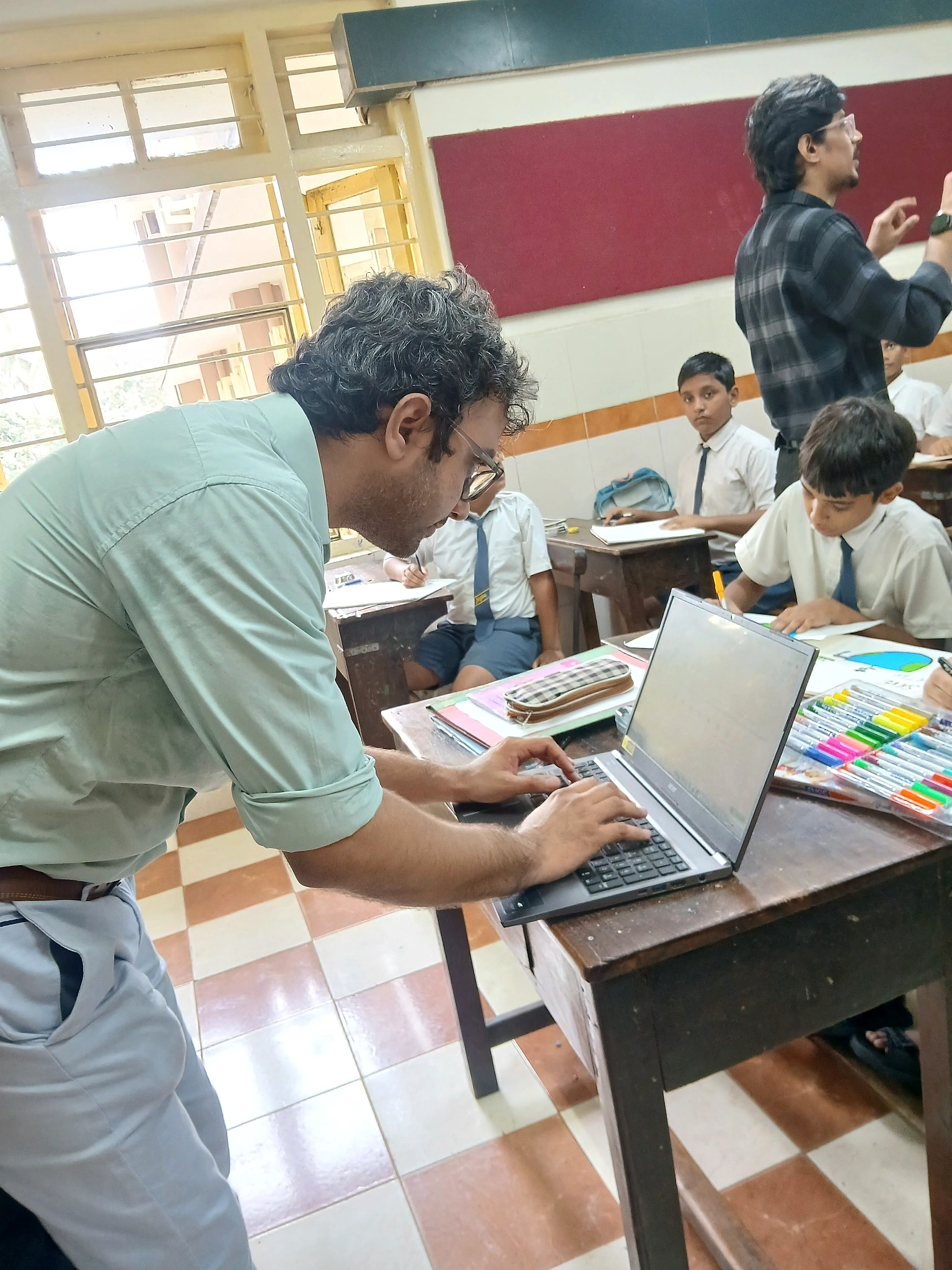 Working directly with students in a classroom